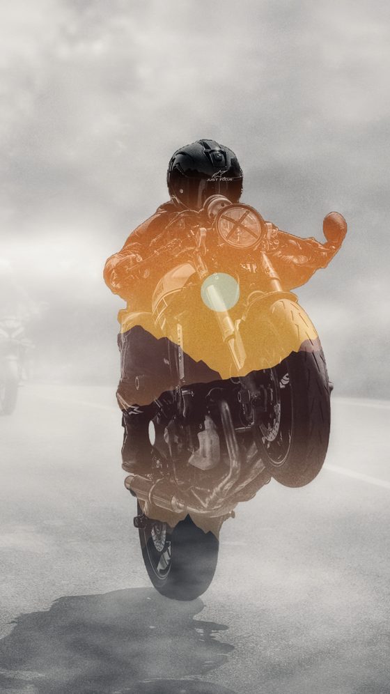 Motorcyclist as a silhouette in fog made with Double Exposure