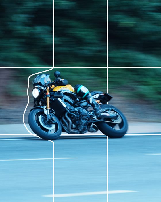 Motorcycle photo bursting out of a grid made with Grid Pop-Out
