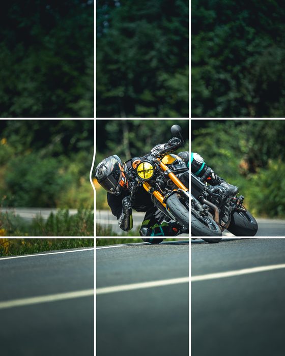 Motorcycle photo bursting out of a grid made with Grid Pop-Out