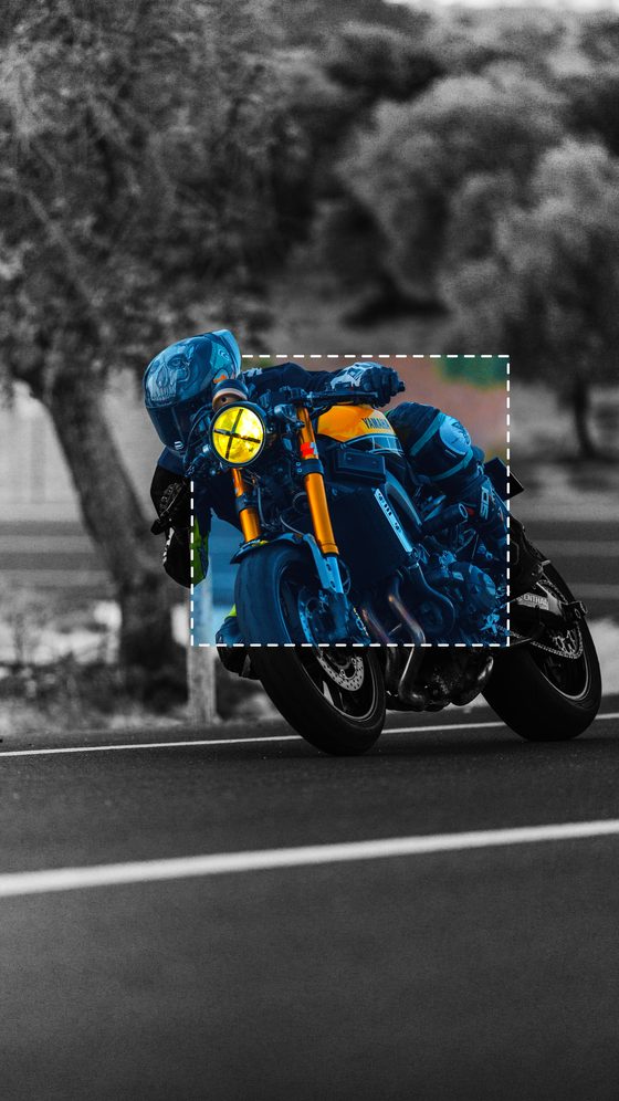Motorcycle photo with one region highlighted in blue using Region Mask